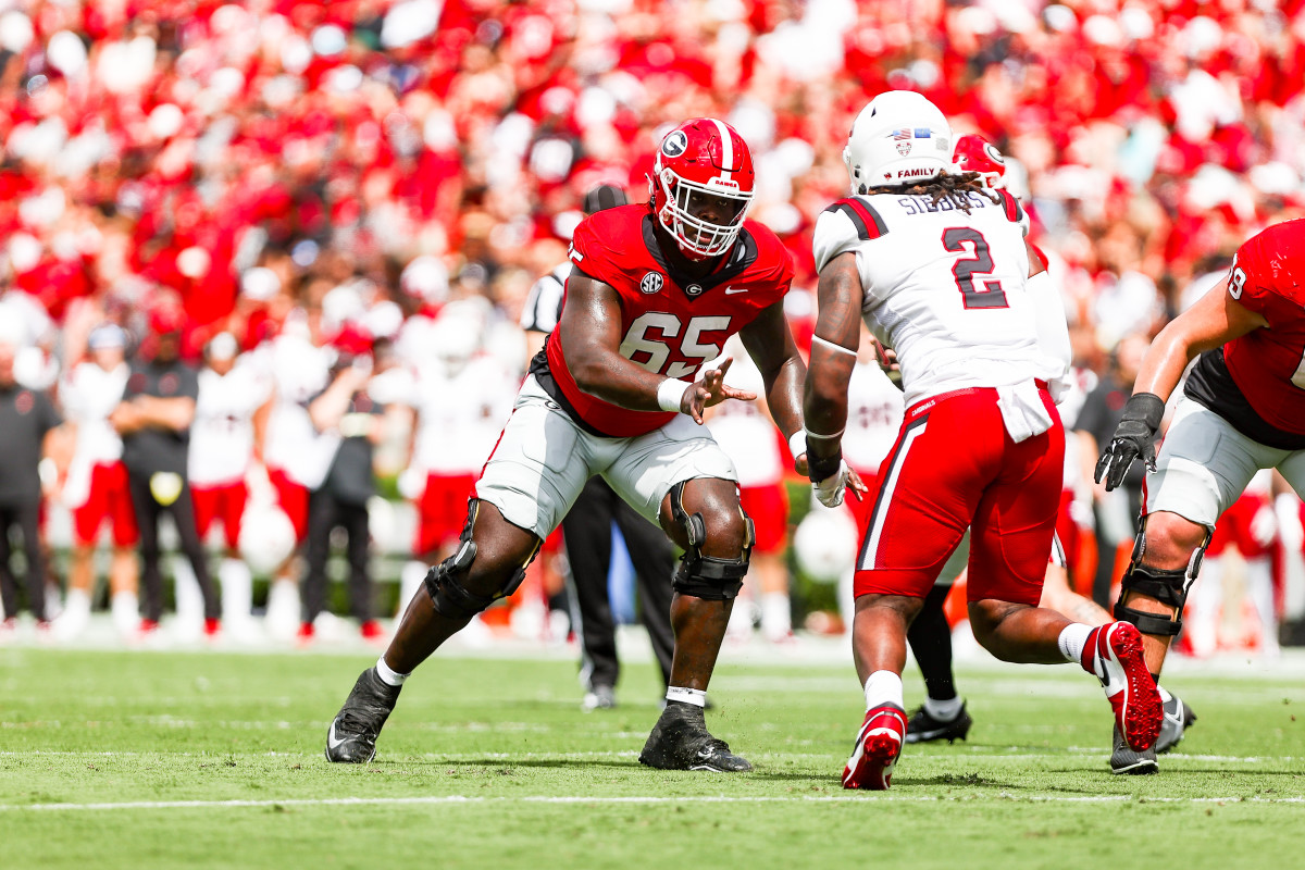 Georgia offensive lineman Amarius Mims (65) during Georgia’s game against Ball State on Dooley Field at Sanford Stadium in Athens, Ga., on Saturday, Sept. 9, 2023. (Tony Walsh/UGAAA)